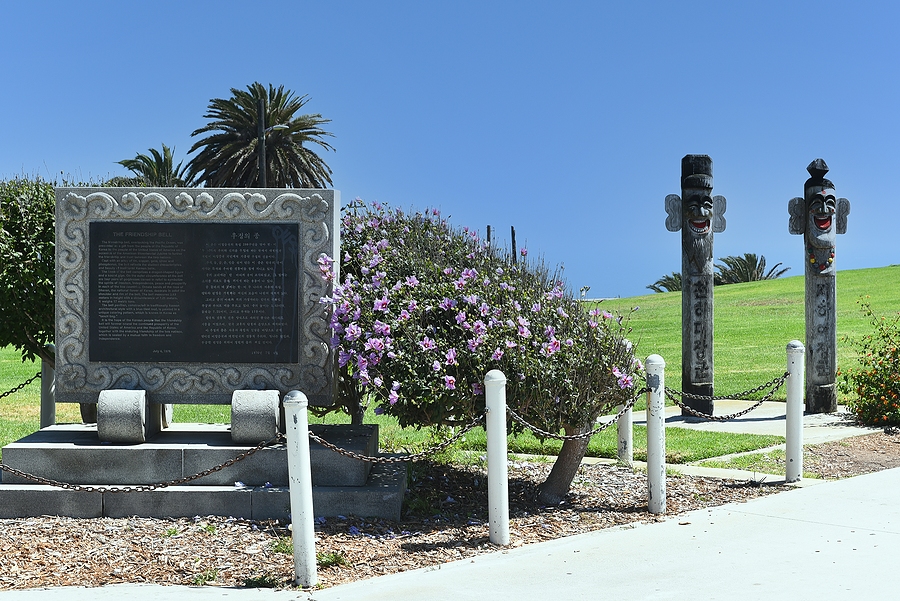 SAN PEDRO, CALIFORNIA - 27 AUG 2021: Sign and Totems at the Korean Friendshoip Bell in Angels Gate Park.